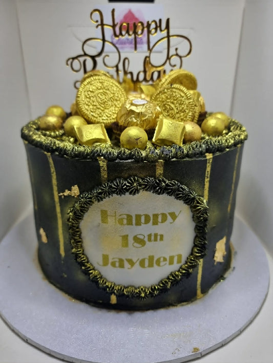 Black and Gold Cake with Chocolates
