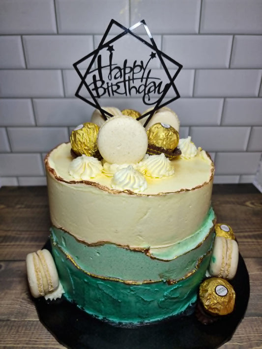 Teal and White Cake with Chocolates and Macarons