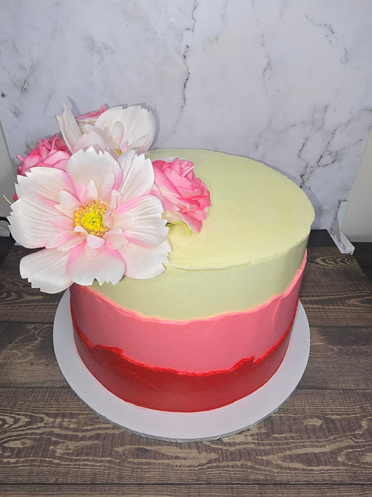 Pink and White Cake with Flowers