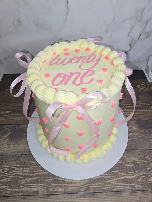 White and Pink mini heart/ribbon cake.