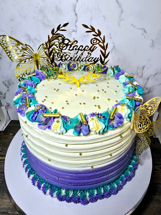 White, purple and teal cake with butterflies